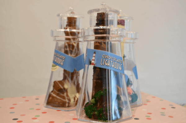 solid chocolate lighthouses inside clear lighthouse containers