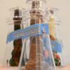 close up of solid chocolate lighthouses inside clear lighthouse containers