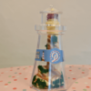 solid chocolate lighthouse inside clear lighthouse container
