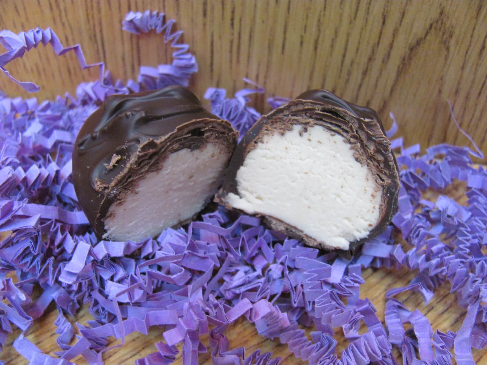 close up of 8 oz Homemade Easter Egg split to reveal flavor