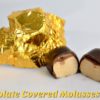 unwrapped and split in half Chocolate Covered Molasses Taffy
