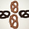 2 dark chocolate covered pretzels and 2 milk chocolate covered preztels