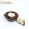 2 Coconut Dainties with one cut in half
