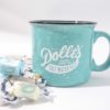 green ceramic mug with the Dolle's® logo and loose taffy
