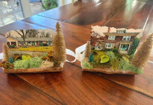 Two custom house ornaments.