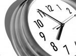 Silver clock with hands set to 8:55
