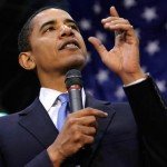 President Obama points upward during a speech