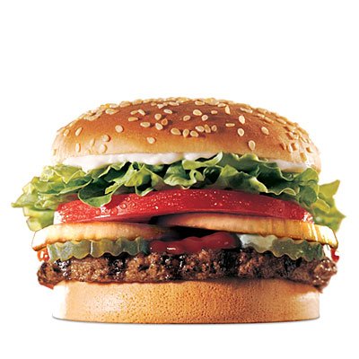 A hamburger piled high with all the toppings