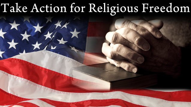 Hands folded over Bible with American flag