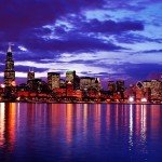 City skyline at dusk with oceanview