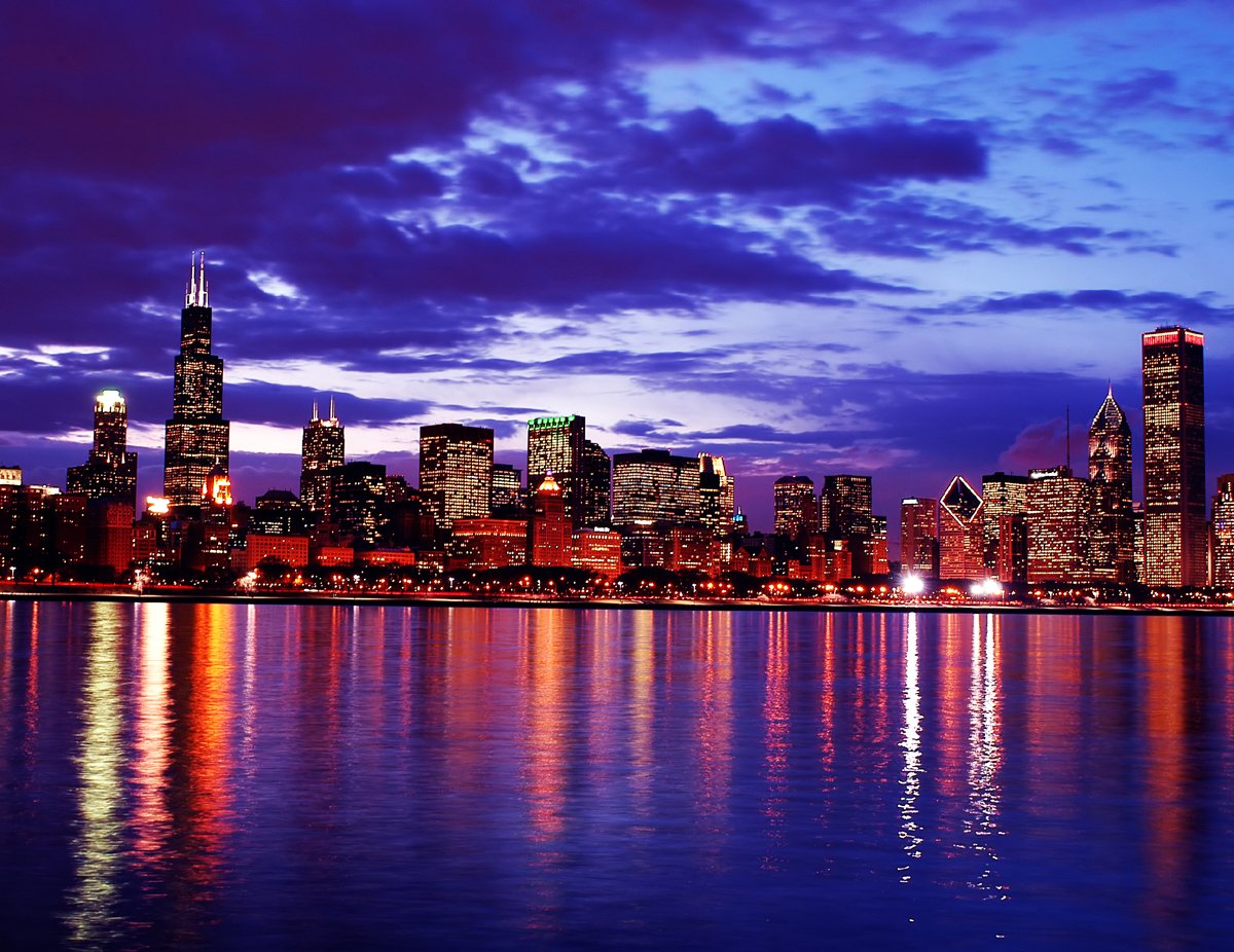 City skyline at dusk with oceanview