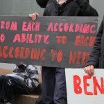 Sign reads From each according to ability, to each according to need