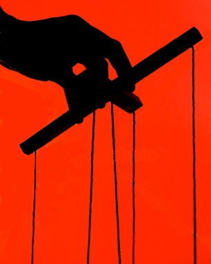Silhouette of a puppeteer's hand controlling strings