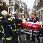 EMS safely placing individual on stretcher into ambulance