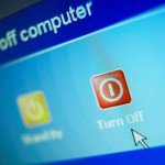 Arrow pointer from computer mouse points to Turn Off button on computer