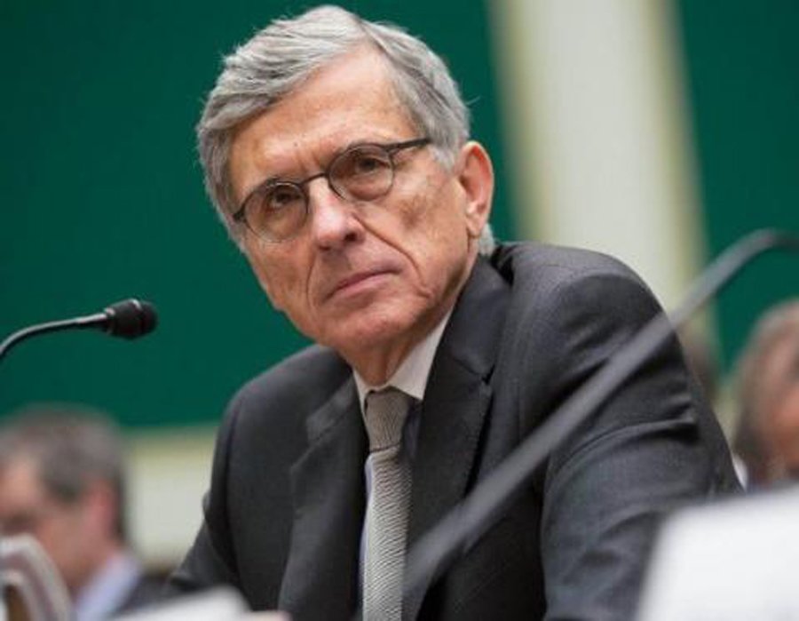 Tom Wheeler at speaking event with blank facial expression