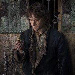 Still image from the Lord of the Rings franchise of man holding ring