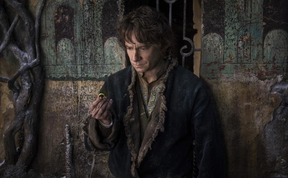 Still image from the Lord of the Rings franchise of man holding ring