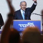 Prime Minister of Israel Netanyahu behind podium waving
