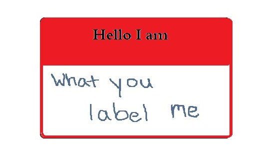 Red and white nametag reads Hello I am what you label me