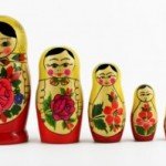 Nesting dolls lined up in order from biggest to smallest