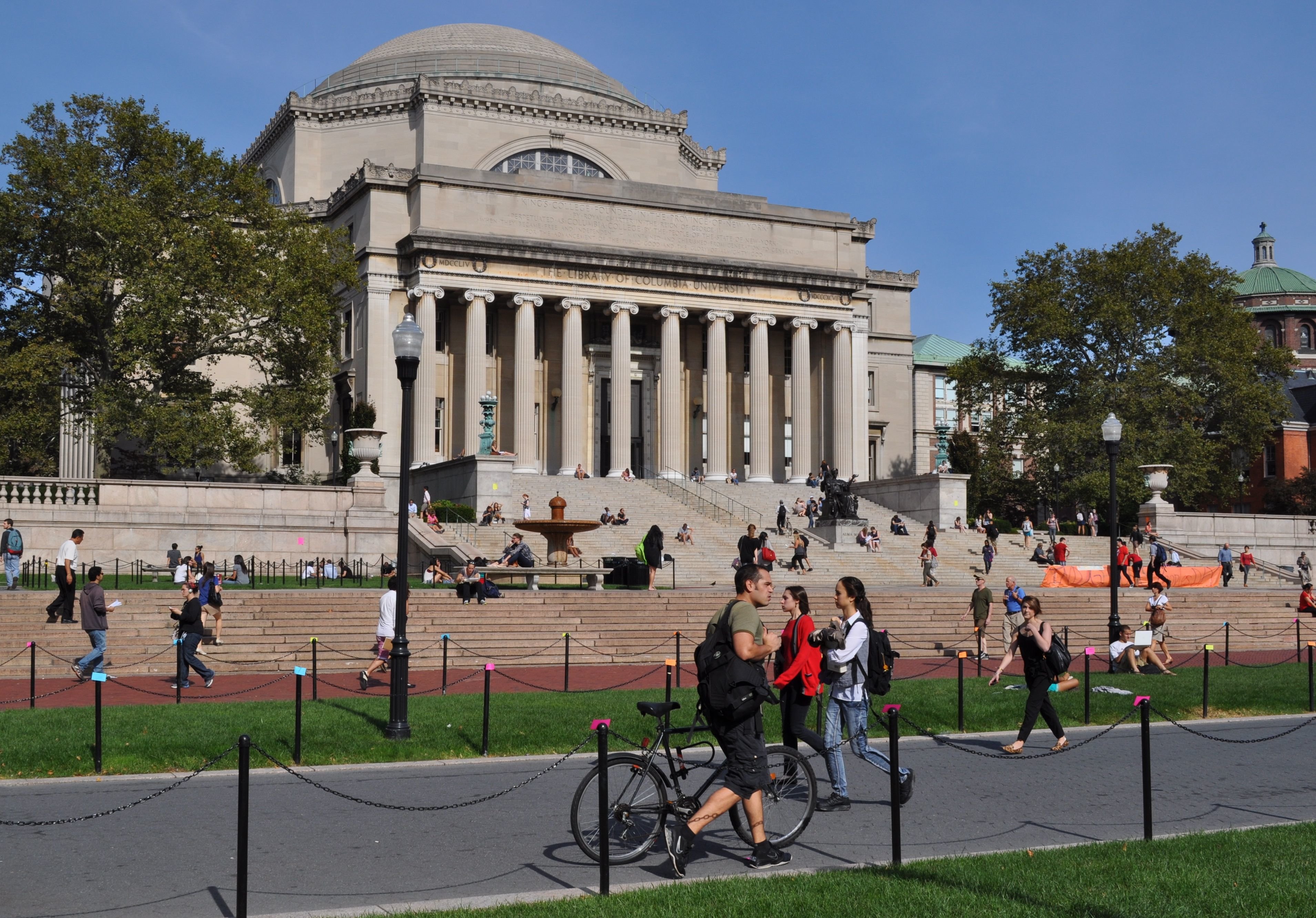 Angled view of Columbia University and students walking to and from campus