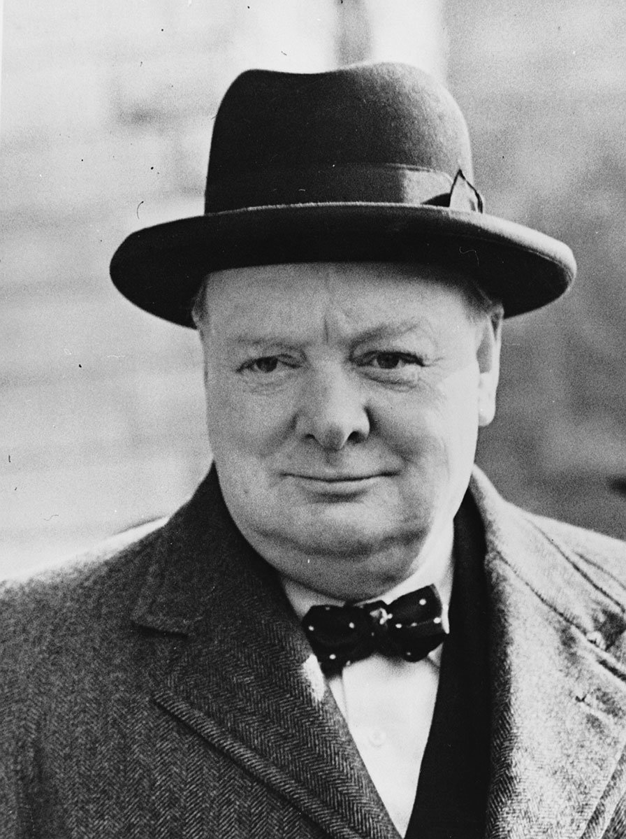 Old black and white photograph of Winston Churchill in a tophat