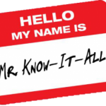 Red and white nametag reads Hello My Name Is Mr. Know-It-All
