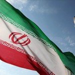 Iran flag of green, white, and red with emblem of Iran in red