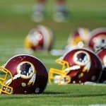 Helmets of the Washington Redskins on football field