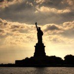 Statue of Liberty with clouds in the background