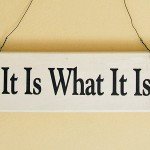 Wall hanging reads It Is What It Is