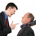 Man yelling and pointing at another man