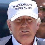 Donald Trump wearing a white hat reads Make America Great Again