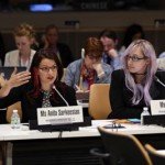 Women sit during discussion board conversation