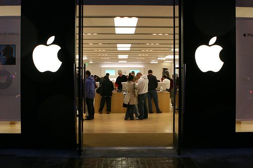 Street view of customers in an Apple retail store