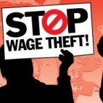 Silhoette holds sign that reads Stop Wage Theft!