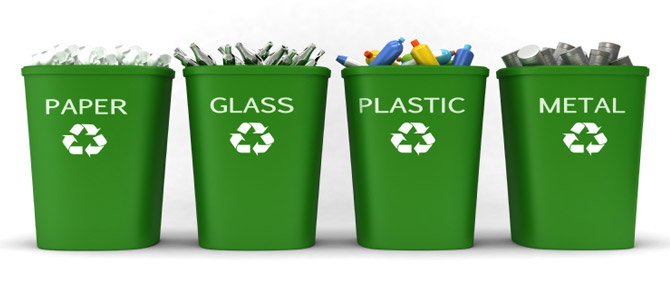 Four green recycle bins filled with materials respectively