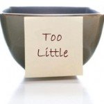 Three ceramic cups: Too Much, Too Little, Just Right