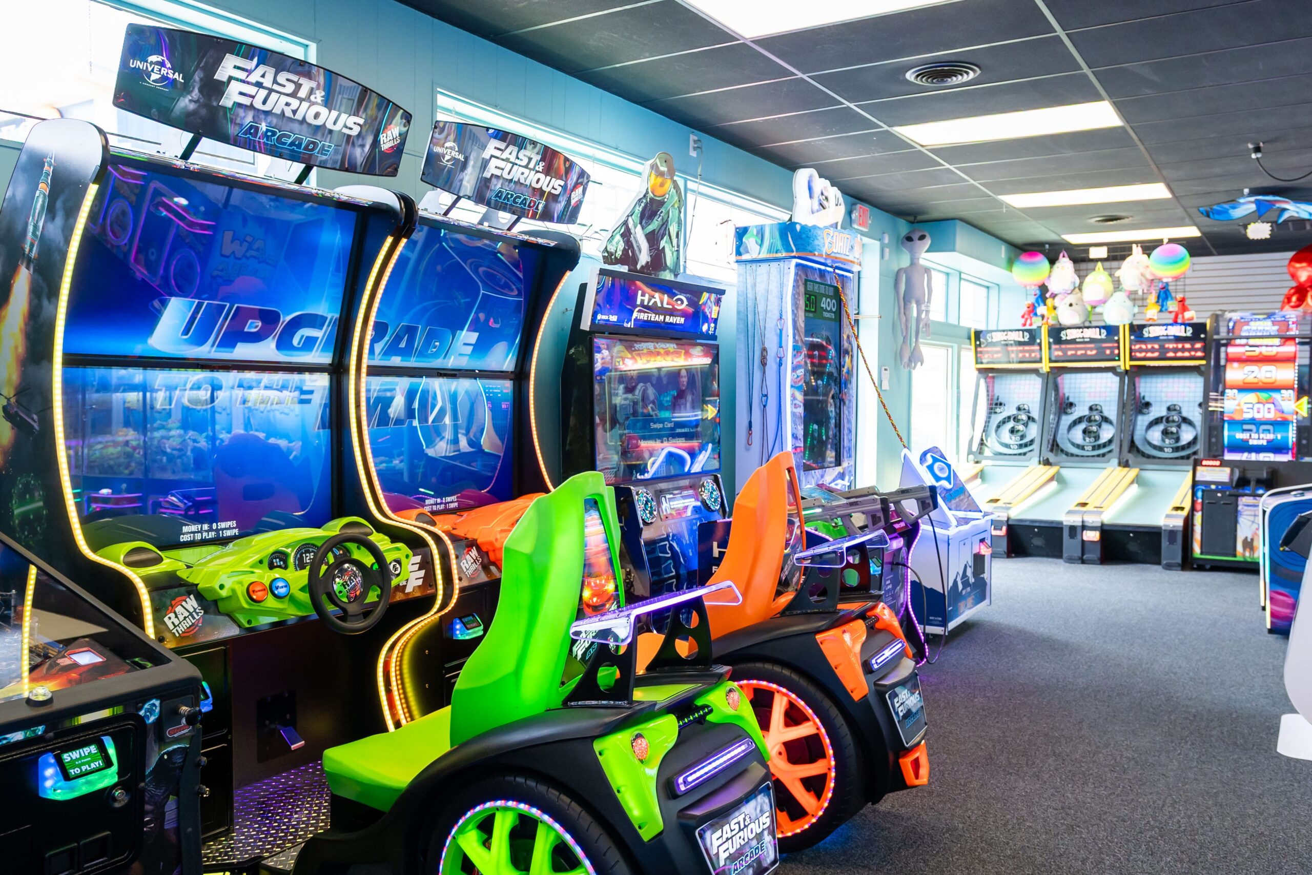 Racing games at an arcade.