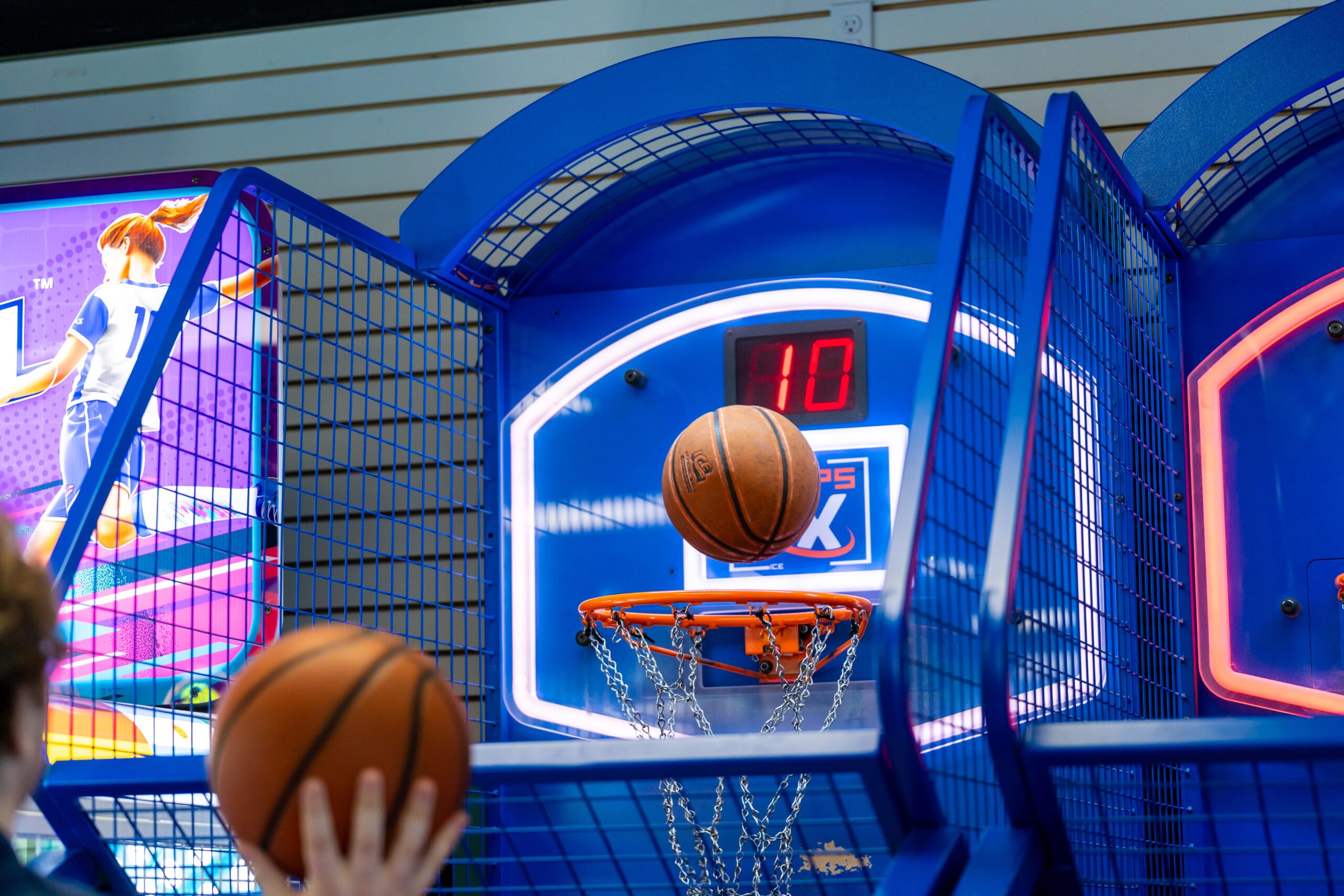 A basketball shooting game at an arcade