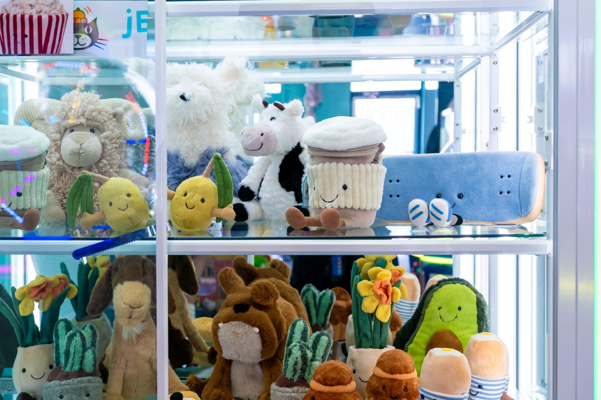 Jellycat toy prizes at an arcade.