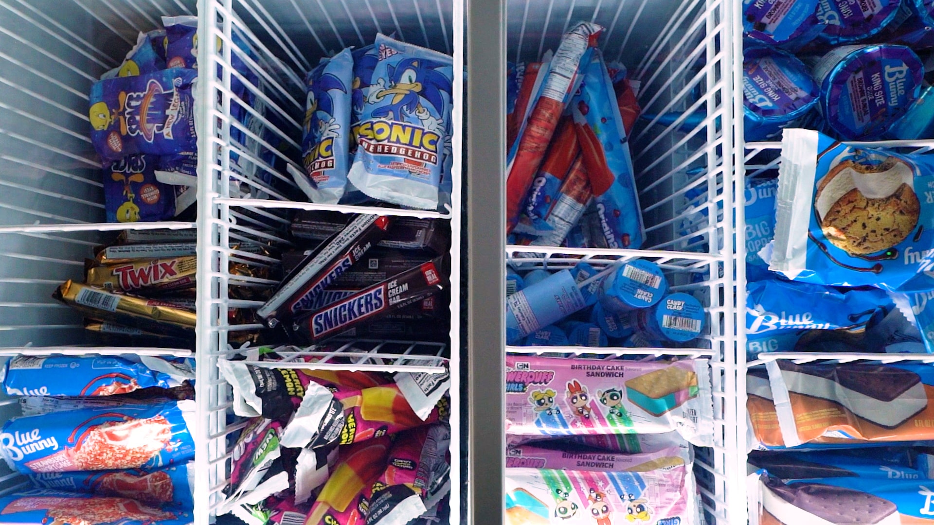Pre packaged ice cream in an ice cream freezer.