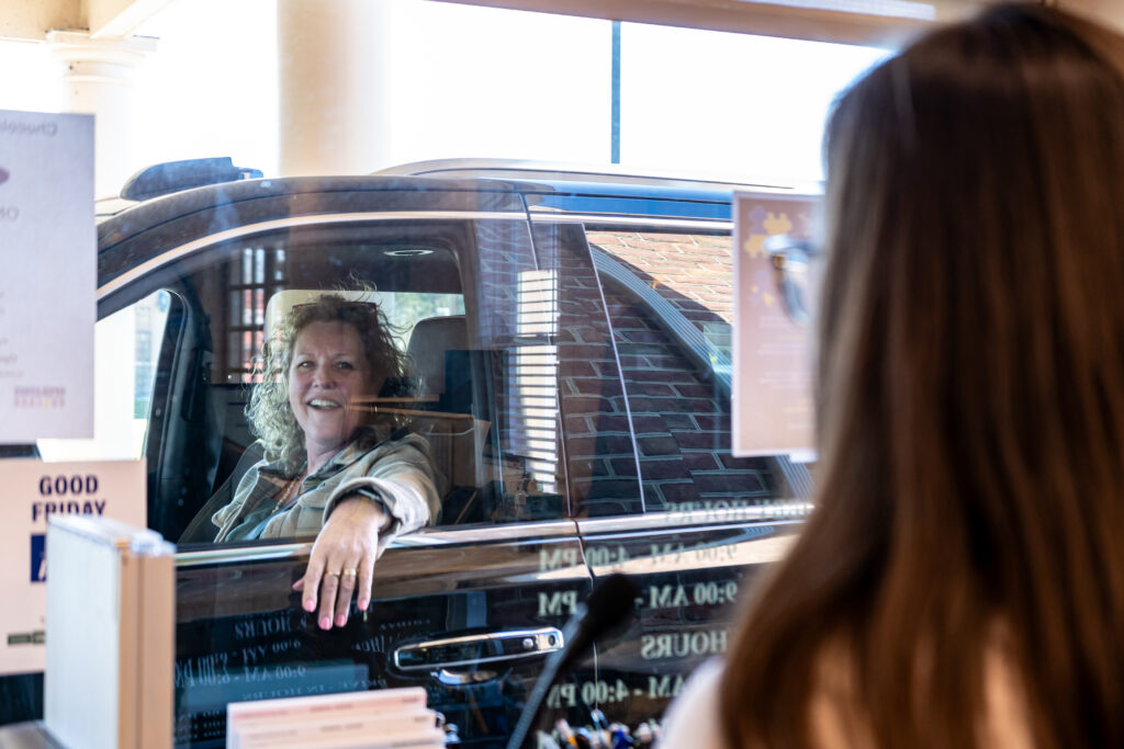 Customer at the drive through window for farmers bank of willards