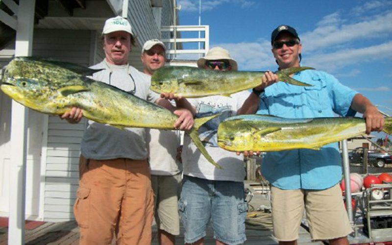 men-holding-mahi.jpg