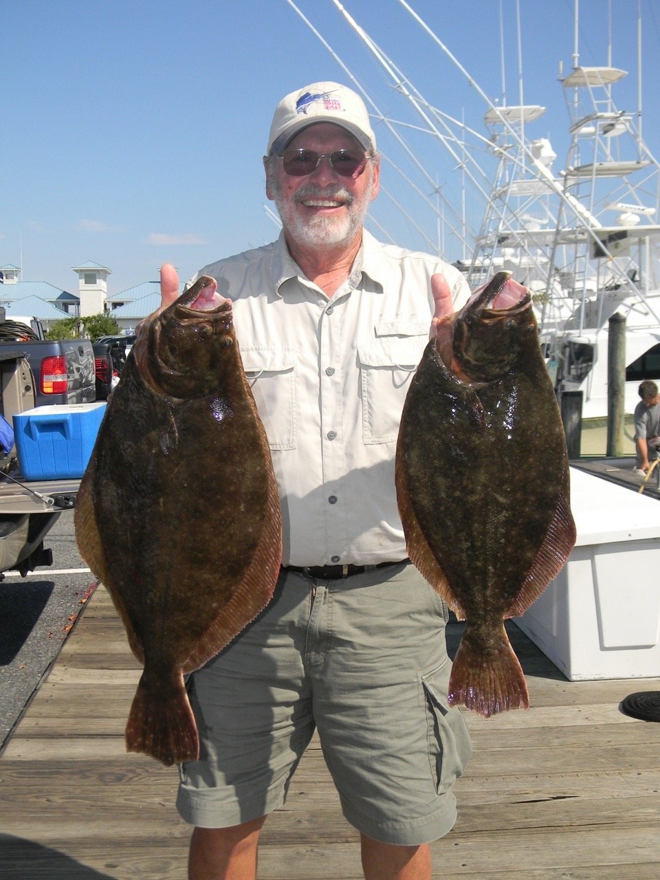 WAHOOOO!  One Drop….Two Big Flounder!