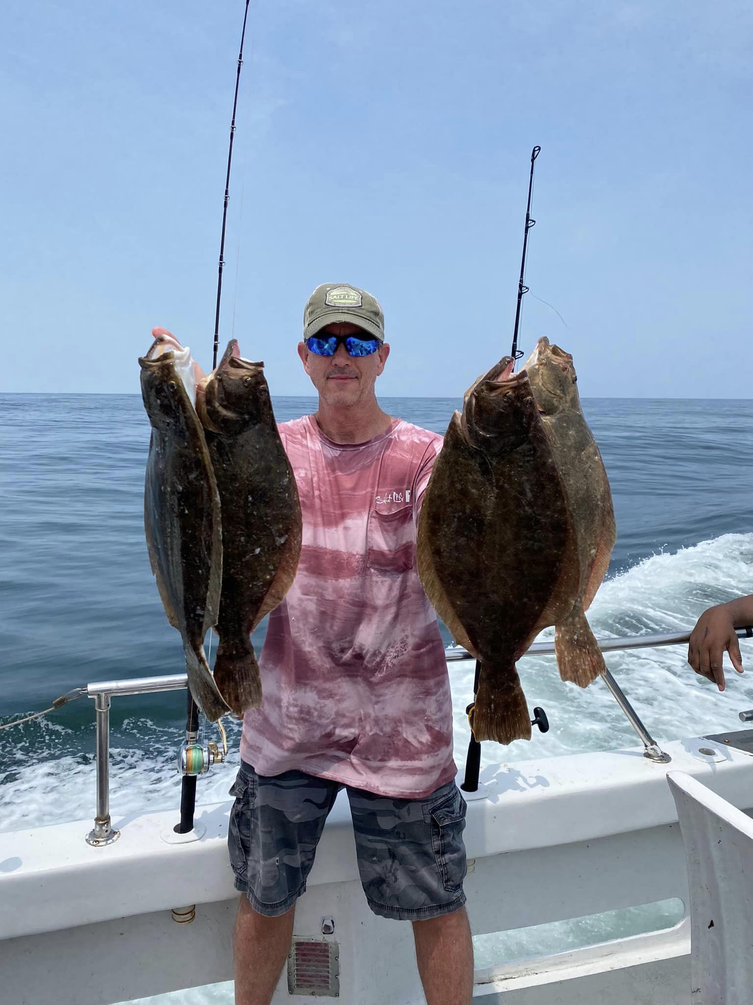 Flounder On A Flat Calm Ocean