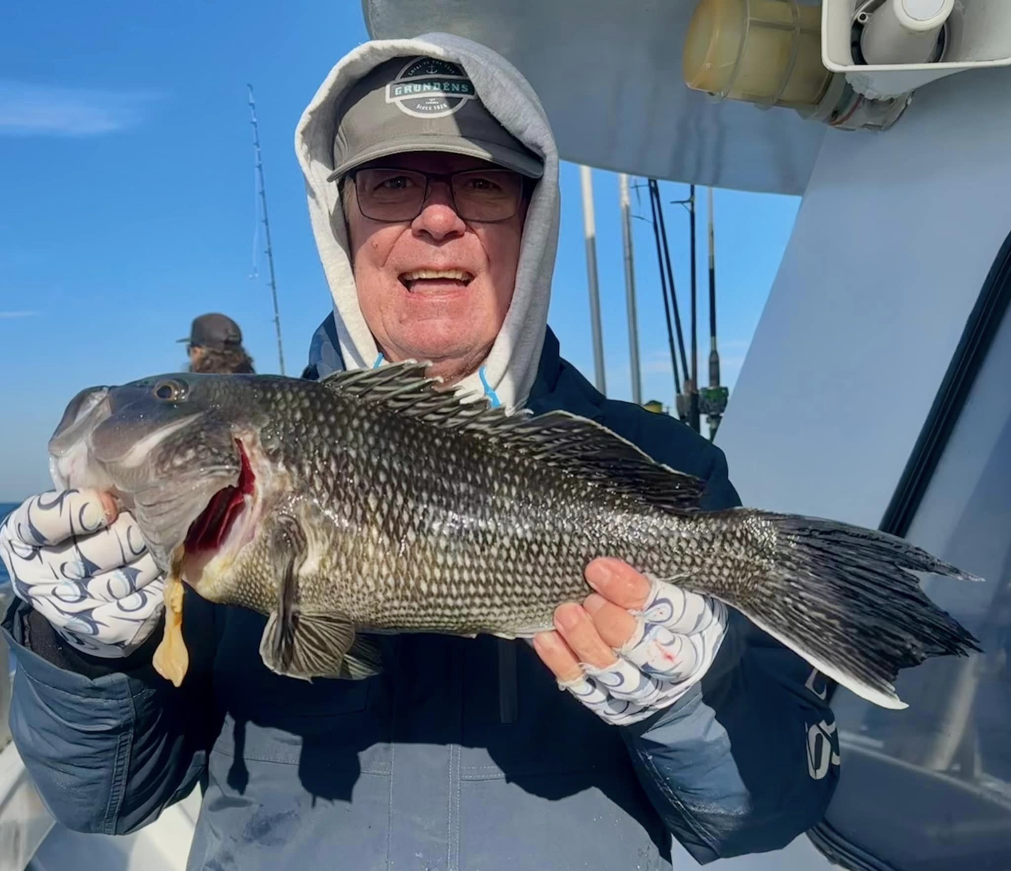 Flat Calm Seas, Big Flounder and Boat Limits of Sea Bass