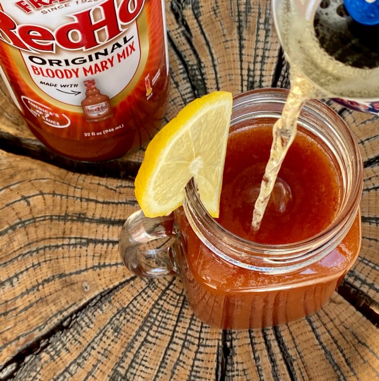 bloody mary cocktail with frank's bottle