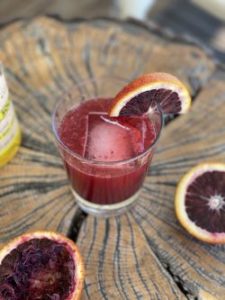 GEORGE’S® Blood Orange Bourbon Sour served with Cocktail blood orange garnish